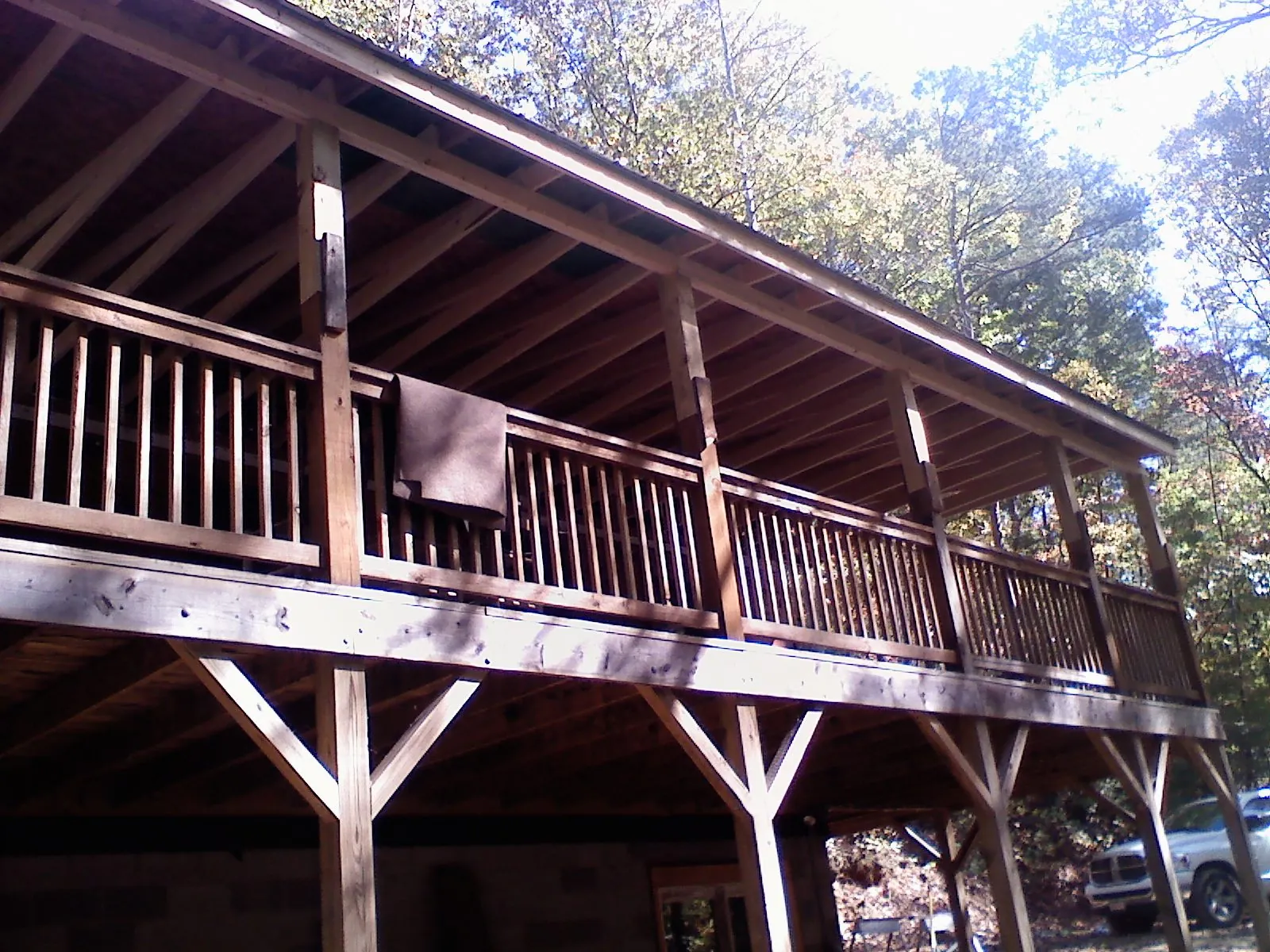 Timber framing under a new elevated porch and deck — Roof Leak Repair in Hutto by Roofing Brothers